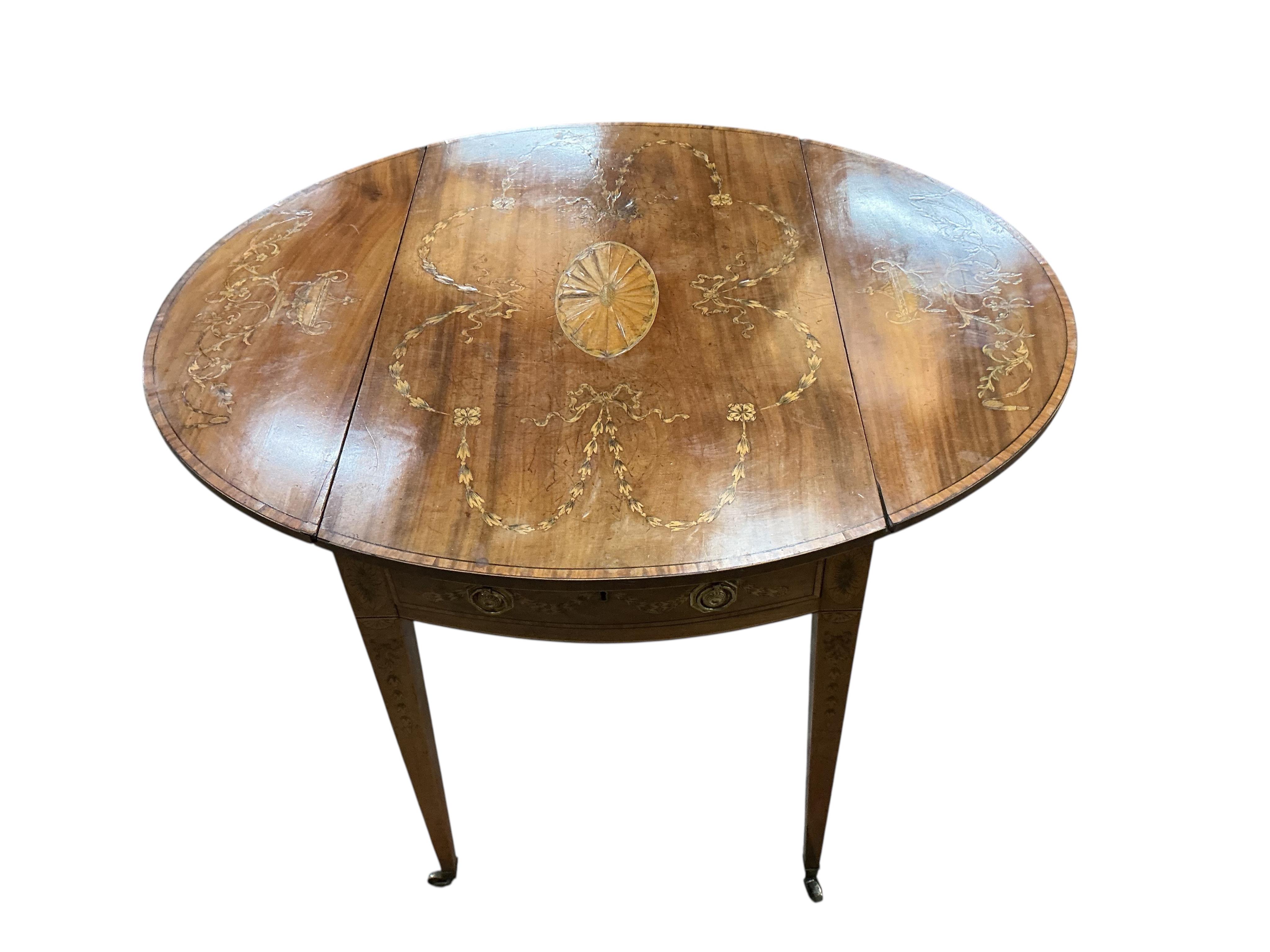 A George III oval mahogany and later marquetry inlaid Pembroke table, width 52cm, depth 81cm, height 72cm